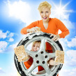 Sisters are cleaning a wheel with sponges outdoors