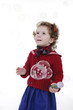 little girl with blond curly hair studio shoot