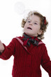 little girl with blond curly hair studio shoot