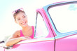 Woman driving vintage car