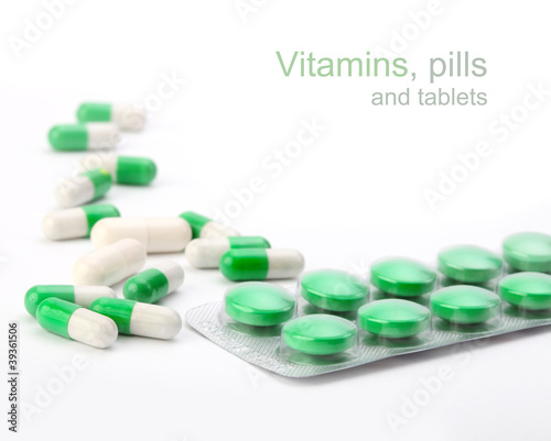 Photo: vitamins, pills and tablets vitamins, pills and tablets