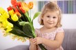 Photo: Cute little girl with flowers Cute little girl with flowers