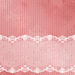 pink and white background with lace