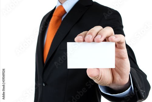 Photo: Businessman showing blank business card isolated on white Businessman showing blank business card isolated on white