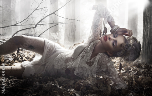 Photo: Beautiful lady lying and posing Beautiful lady lying and posing