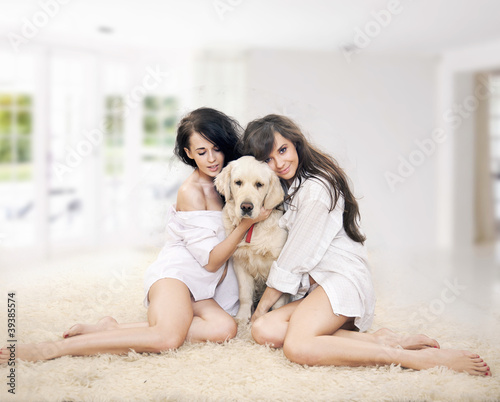 Photo: Cute women with dog smiling Cute women with dog smiling