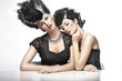 Photo: Two sexy women wearning wigs Two sexy women wearning wigs
