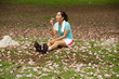 Pretty Thai woman looking flower after exercise .
