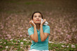 Pretty Thai woman rest exercise in the park .