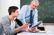 teacher with high school students
