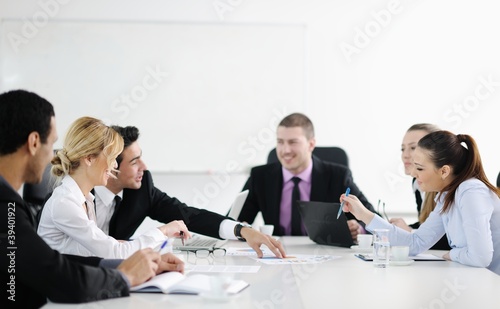 Photo: Group of young business people at meeting Group of young business people at meeting