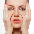 woman with hands on face