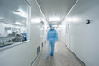 Technicians working in the pharmaceutical production line Technicians working in the pharmaceutical production line
