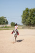 Little Girl Taking Horseback Riding Lessons