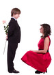 Little schoolboy with rose for mother