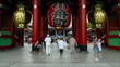 Visitors entering Senso-Ji Temple in Tokyo, Japan