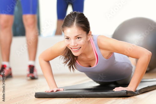 Photo: Gym woman working out Gym woman working out