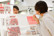 woman is choosing lipstick