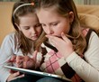 Children playing with tablet Children playing with tablet