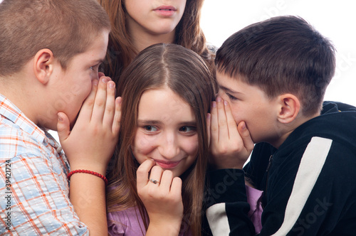 Photo: Teenages gossiping about their mutual friend Teenages gossiping about their mutual friend