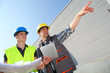 Young people in professional training on industrial site