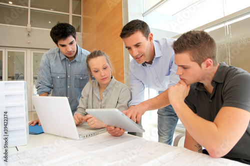 Photo: Students in architecture working on electronic tablet Students in architecture working on electronic tablet