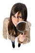 a beautiful girl holds a magnifying lens a beautiful girl holds a magnifying lens