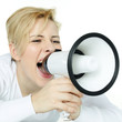 Pretty blonde woman shouting loud through megaphone