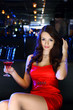 Attractive woman in night club with a drink
