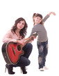 mother and her little daughter with guitar