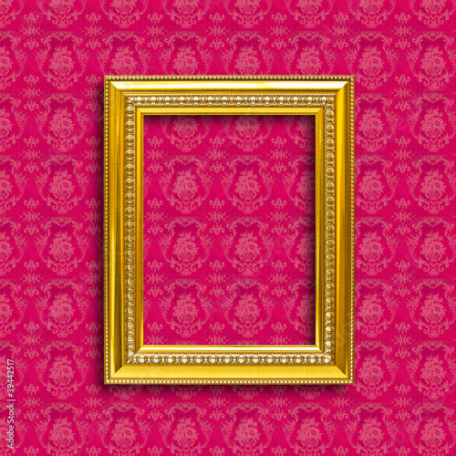 Photo: frame of golden wood on the wallpaper frame of golden wood on the wallpaper