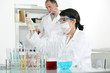 Scientists performing experiments