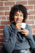Teenager with cup of coffee