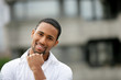 Younf african man posing outside