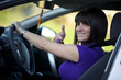 Woman driving her new car