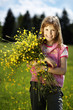 Girl with blossoming flowers