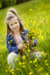Little girl picking the flowers