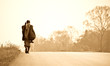 Buddhist monk take to the road in forest as a form of meritamaki Buddhist monk take to the road in forest as a form of meritamaki