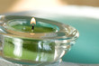 Photo: Spa scene with aromatic candle Spa scene with aromatic candle