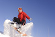 Photo: Young woman on snowboard Young woman on snowboard