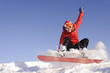 Photo: Young woman on snowboard Young woman on snowboard