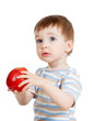 attractive child holding red apple, isolated on white