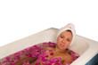 beautiful woman enjoying floral bath