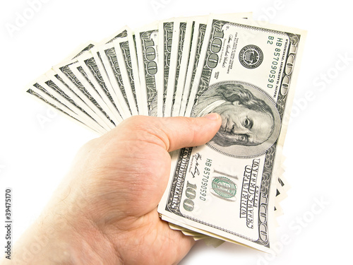 Photo: The isolated hundred dollar in a hand The isolated hundred dollar in a hand
