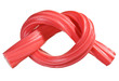 Red gummy candy (licorice) rope, isolated on white closeup view