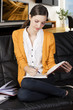 the girl reading a book with absorbed axpression the girl reading a book with absorbed axpression