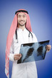 Arab doctor with x-ray print