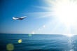 Airplane flying over the sea