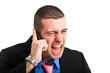 Angry businessman screaming at the phone