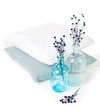 Photo: vintage glass bottles and pillows vintage glass bottles and pillows